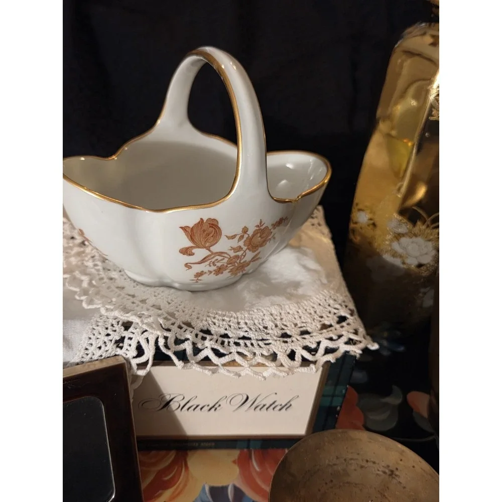 vintage Limoges, France, porcelain compote basket featuring a tall arched...